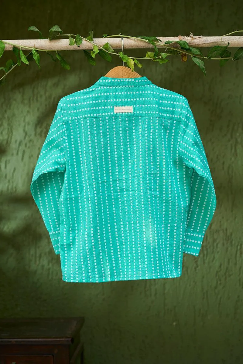Barefoot Boy’ mandarin collar hand block printed malmal cotton unisex full sleeve summer shirt in blue with white polka dots for boys and girls