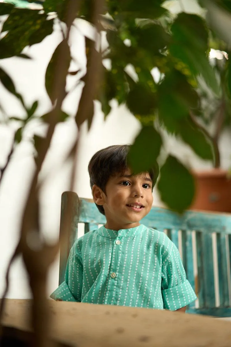 Barefoot Boy’ mandarin collar hand block printed malmal cotton unisex full sleeve summer shirt in blue with white polka dots for boys and girls