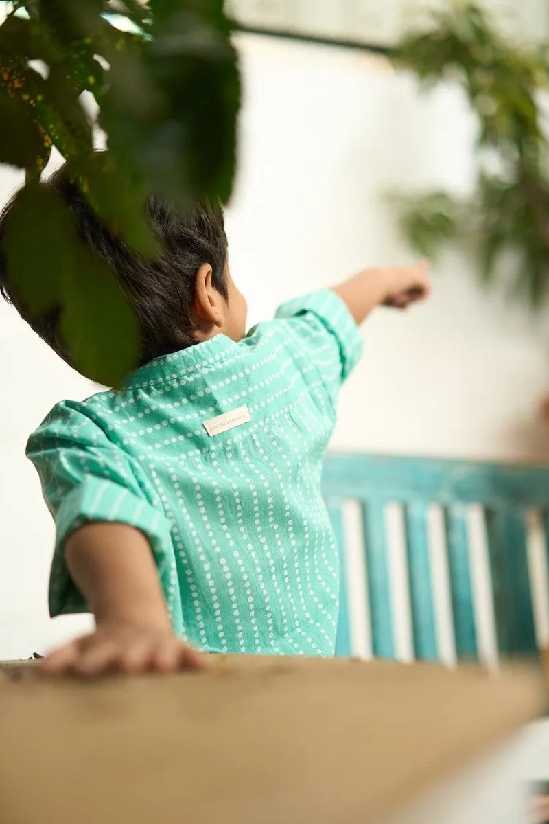 Barefoot Boy’ mandarin collar hand block printed malmal cotton unisex full sleeve summer shirt in blue with white polka dots for boys and girls